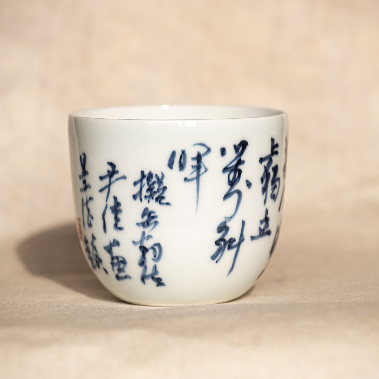 Qinghua calligraphy porcelain cup